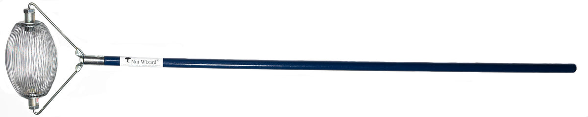 An Extra-Small Nut Wizard® with its many wires that are held together with metal plates to create a "basket,"; The plates have two large bolts sticking out on either end. The bolts are attached to a “bail,” a thin metal wire-type part bent in three points with a threaded piece in the center that attaches the Nut Wizard® basket to a blue, four-foot wooden handle. The handle has a white label with a tree and the words "Nut Wizard®" on it.