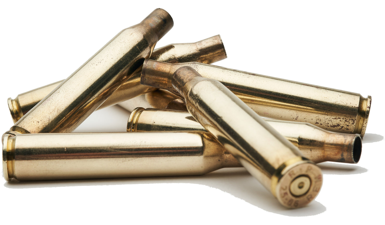 a pile of spent large caliber brass